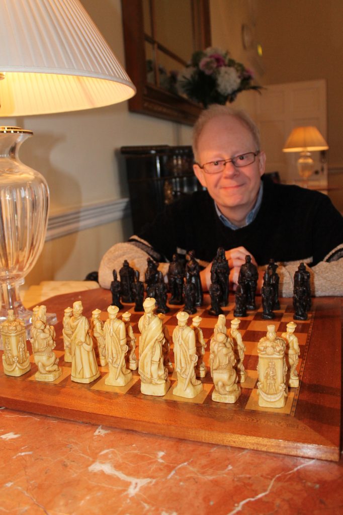 Keven Lamb with decorative chess set