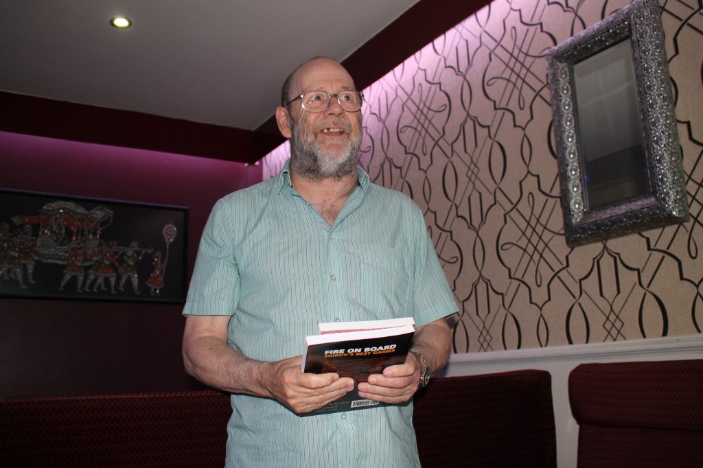 Book Prize Tournament organiser Peter Przybycin with the Prizes, 26 May 2022