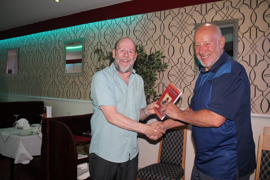 Peter Przybycin presents Book Prize to Minor section winner Nobby George, 26 May 2022