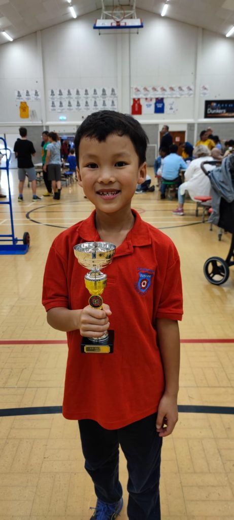 Timothy Hu with 4th place Trophy at South of England Junior Congress